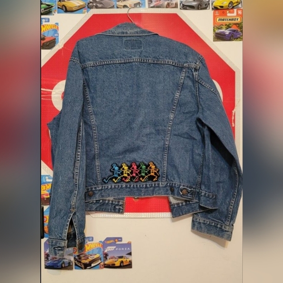 VINTAGE Levi's Blue Denim Jacket with Vibrant Embroidery Adult.